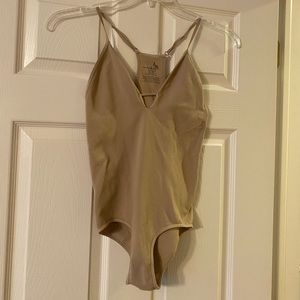 Free People bodysuit in beige